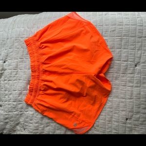 Lululemon. Hotty hot 4”. Size 4. Highlighter orange